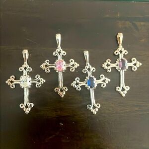 Four Sterling Silver cross pendants